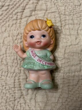 Russ Miss December Ceramic Figurine in Mint Green and Yellow